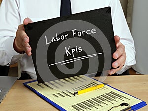 Financial concept about Labor Force Kpis with sign on the piece of paper