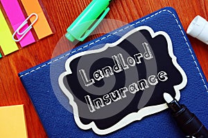 Financial concept about Landlord Insurance with inscription on the sheet