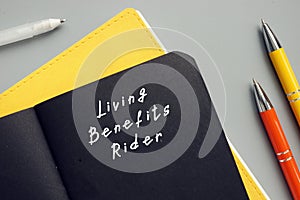 Financial concept about Living Benefits Rider with phrase on the page