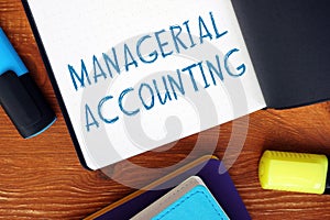 Financial concept about MANAGERIAL ACCOUNTING exclamation marks with sign on the piece of paper