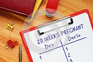 Financial concept meaning 20 WEEKS PREGNANT Do`s and Don`ts with phrase on the piece of paper