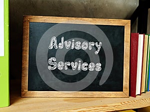 Financial concept meaning Advisory Services with inscription on the sheet