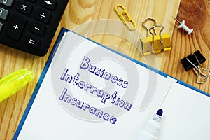 Financial concept meaning Business Interruption Insurance with sign on the piece of paper