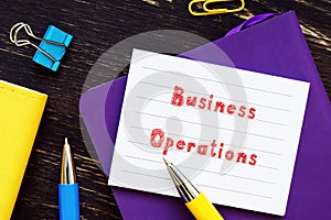 Financial concept meaning Business Operations with sign on the piece of paper