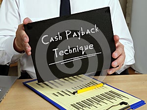 Financial concept meaning Cash Payback Technique with phrase on the piece of paper