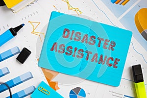 Financial concept meaning Disaster Assistance with phrase on the sheet