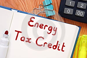 Financial concept meaning Energy Tax Credit with inscription on the sheet