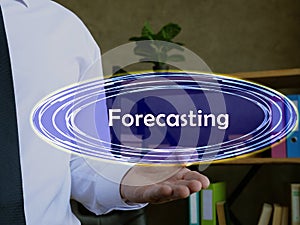 Financial concept meaning Forecasting with phrase on the page