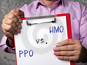 Financial concept meaning health maintenance organization HMO vs. PPO Preferred provider organization with phrase on the page photo