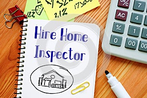 Financial concept meaning Hire Home Inspector with phrase on the page photo