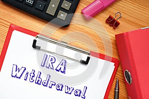 Financial concept meaning Individual Retirement Accounts IRA Withdrawal with inscription on the sheet