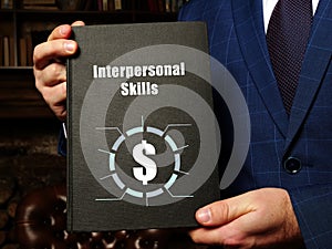 Financial concept meaning Interpersonal Skills with sign on the black notepad