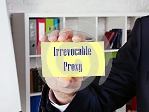 Financial concept meaning Irrevocable Proxy with phrase on the page photo