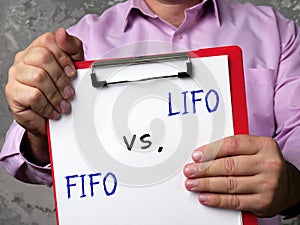 Financial concept meaning Last In, First Out LIFO vs. FIFO First In, First Out with phrase on the page