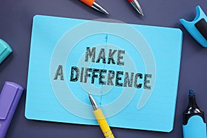 Financial concept meaning Make A Difference with sign on the sheet