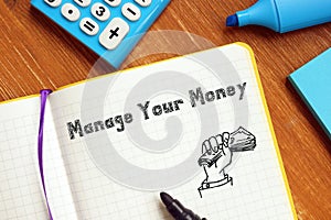Financial concept meaning Manage Your Money with phrase on the page