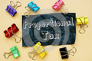 Financial concept meaning Proportional Tax with phrase on the piece of paper