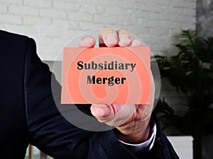 Financial concept meaning Subsidiary Merger with inscription on the sheet photo