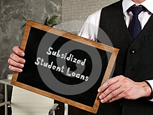 Financial concept meaning Subsidized Student Loans with phrase on the sheet