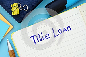 Financial concept meaning Title Loan with sign on the sheet