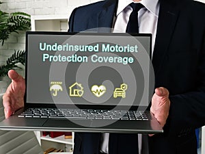 Financial concept meaning Underinsured Motorist Protection Coverage with phrase on the piece of paper