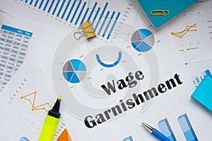 Financial concept meaning Wage Garnishment with phrase on the piece of paper