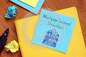 Financial concept about Mortgage Interest Deduction with sign on the page