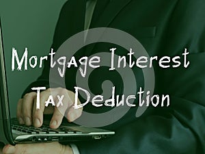 Financial concept about Mortgage Interest Tax Deduction with phrase on the piece of paper