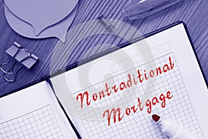 Financial concept about Nontraditional Mortgage with phrase on the sheet photo