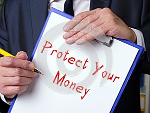 Financial concept about Protect Your Money with sign on the piece of paper