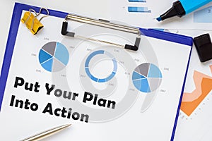 Financial concept about Put Your Plan Into Action with sign on the piece of paper