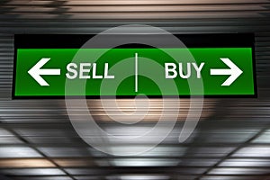 Financial concept. Sell and Buy Arrows sign, indicated stock market photo
