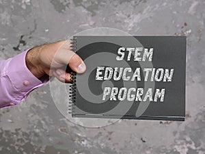 Financial concept about STEM EDUCATION PROGRAM with inscription on the piece of paper