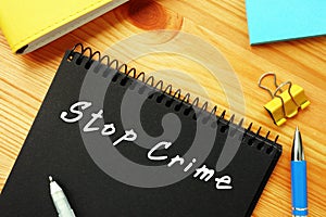 Financial concept about Stop Crime  with phrase on the sheet