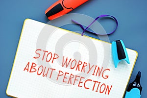 Financial concept about Stop Worrying About Perfection with phrase on the piece of paper