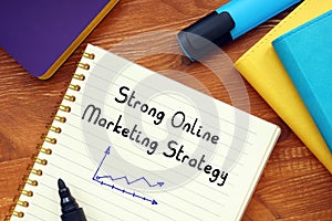 Financial concept about Strong Online Marketing Strategy with inscription on the page