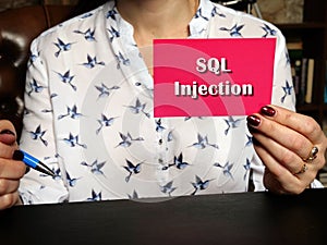 Financial concept about structured query language SQL Injection with sign on blank business card