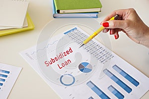 Financial concept about Subsidized Loan with inscription on the sheet