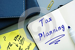 Financial concept about Tax Planning with phrase on the piece of paper