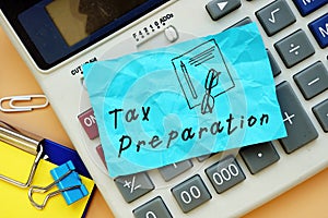 Financial concept about Tax Preparation with inscription on the page