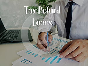 Financial concept about Tax Refund Loans with inscription on the piece of paper