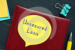 Financial concept about Unsecured Loan with sign on the piece of paper