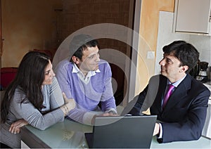 Financial Consultant with Adult Couple photo