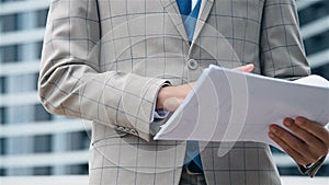 Financial Consultant In Suit Working And Planning With Business Report Document