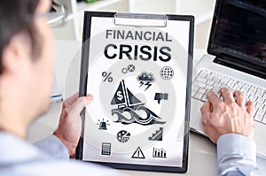 Financial crisis concept on a clipboard