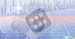 Financial data and graphs over dice against earth, finance and economy concept