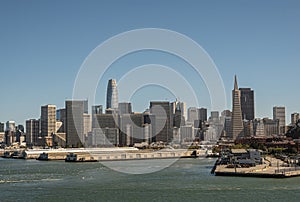 Financial district skyline behind port docks, San Francisco, CA, USA