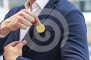 Financial exchange digital wallet or electronic future trade money investment concept. Businessman holding gold bitcoin on own