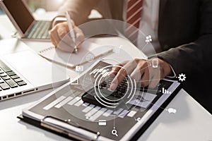 Financial expert analyze business report graph and finance chart at corporate office. Concept of finance economy, banking business