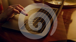 Financial expert looking computer screen on plane. Closeup hands touch trackpad